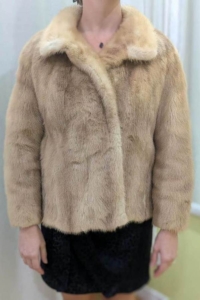 Transformer manteau fourrure Laval